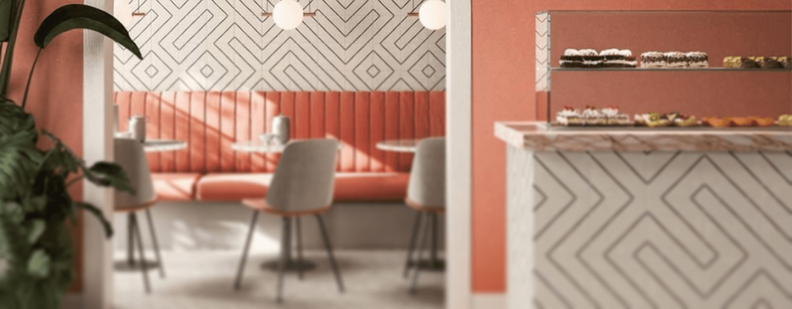 Intérieur décoratif avec carrelage graphique et murs terracotta